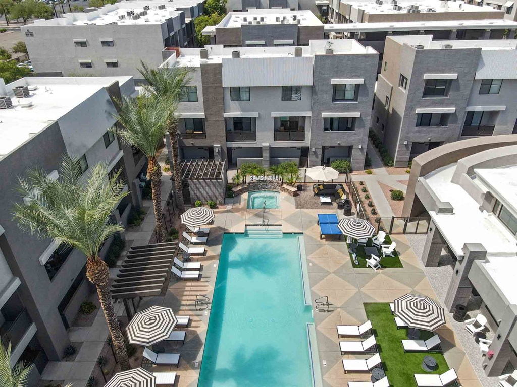 an aerial view of the resort style pool and courtyard