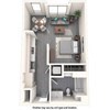 A small white kitchen with a refrigerator, microwave, sink, and a small table.