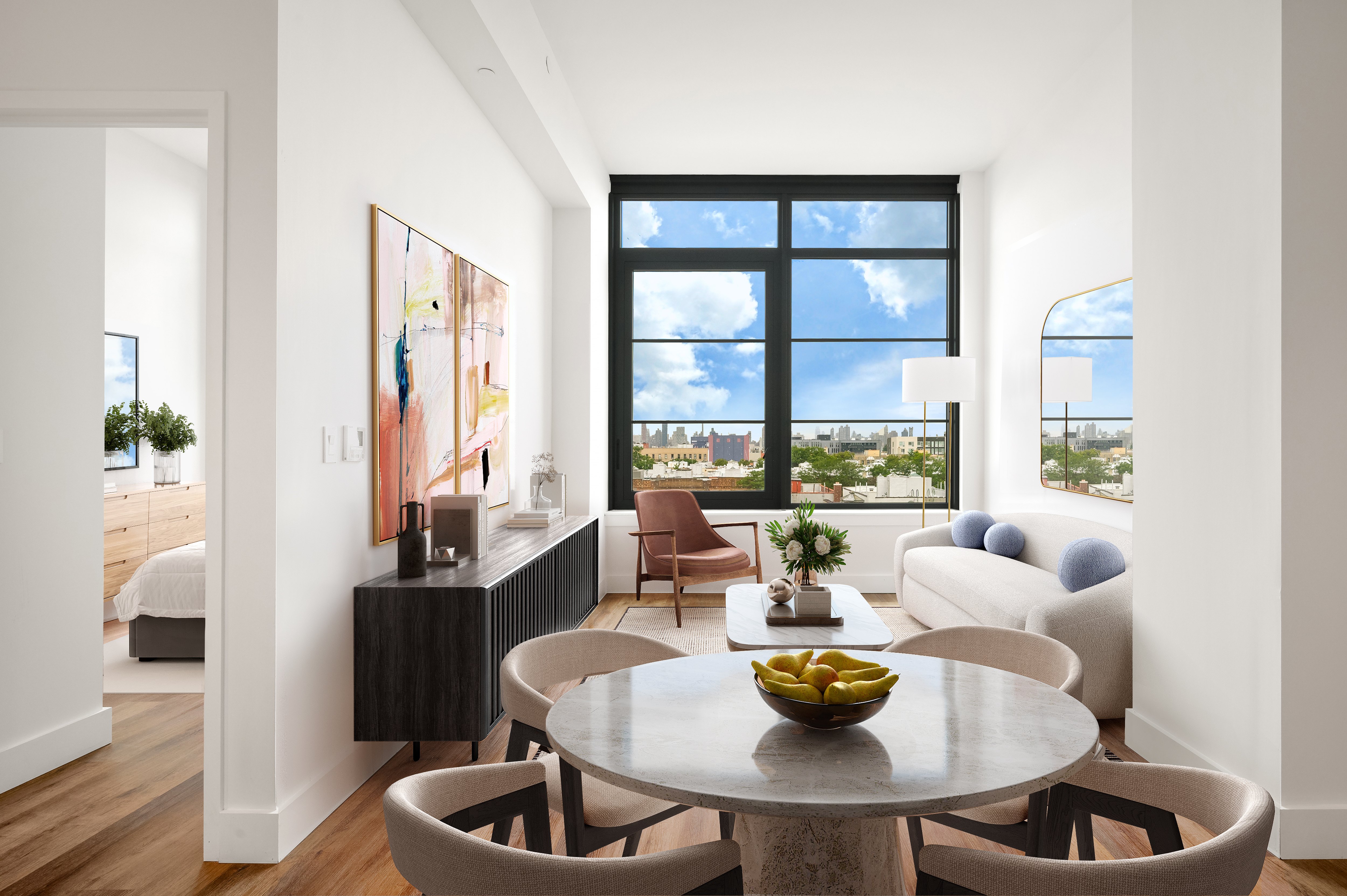 A modern dining room with a large table and chairs.
