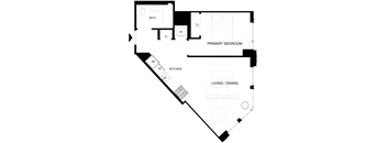 A floor plan of a home with a primary bedroom, living/dining area, and kitchen.