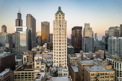 a view of the city from the top of a tall building