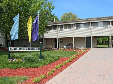A building with a sign that says "Information Center" in front of it.