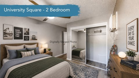 A bedroom with a bed, a dresser, and a framed picture on the wall.