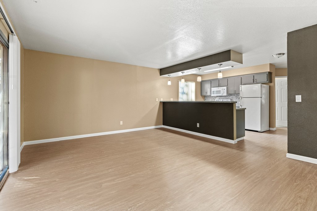 A kitchen area with a countertop and cabinets.at Redwood Cove Apartments, Chico, CA 95928  