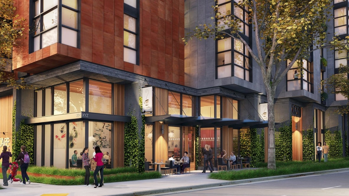 A modern building with people walking in front.
