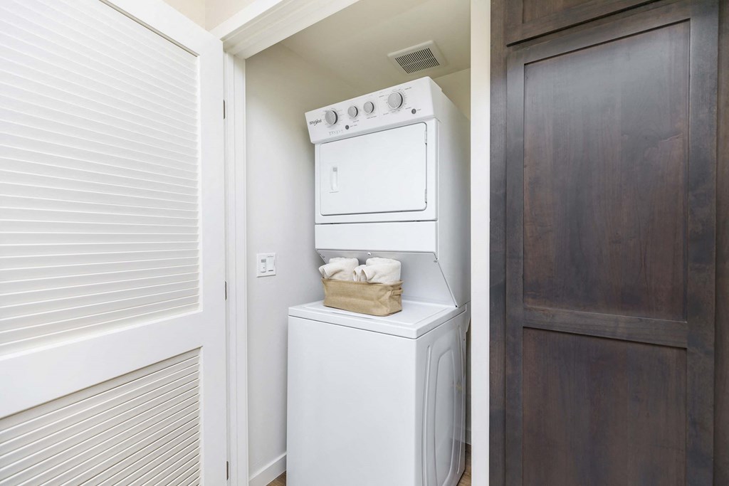a washer and dryer in the laundry room of a home