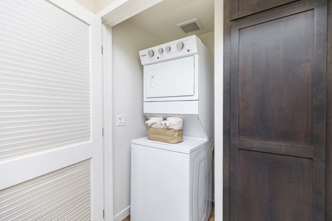 a washer and dryer in the laundry room of a home