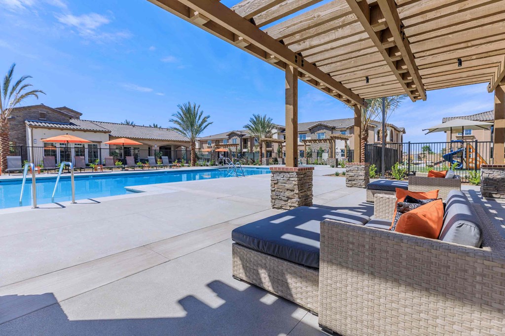 the swimming pool at the estates apartments