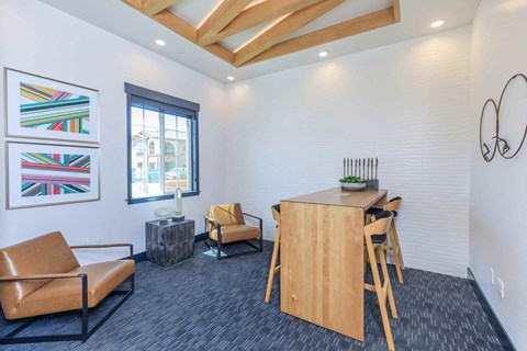 a conference room with a long wood table and chairs