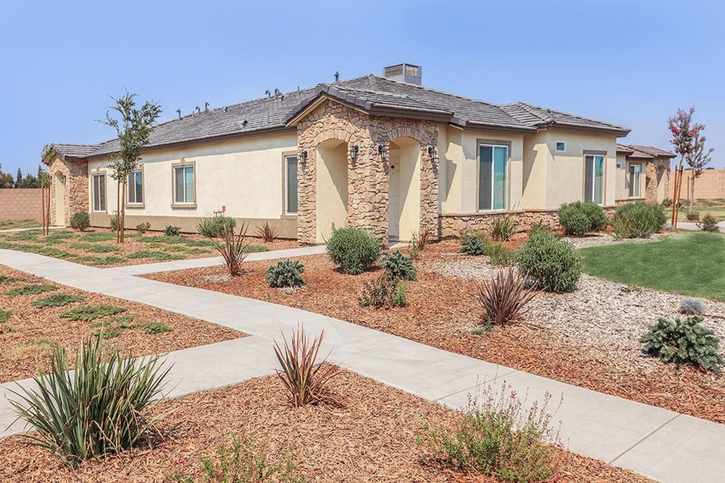 a house with a pathway in front of it