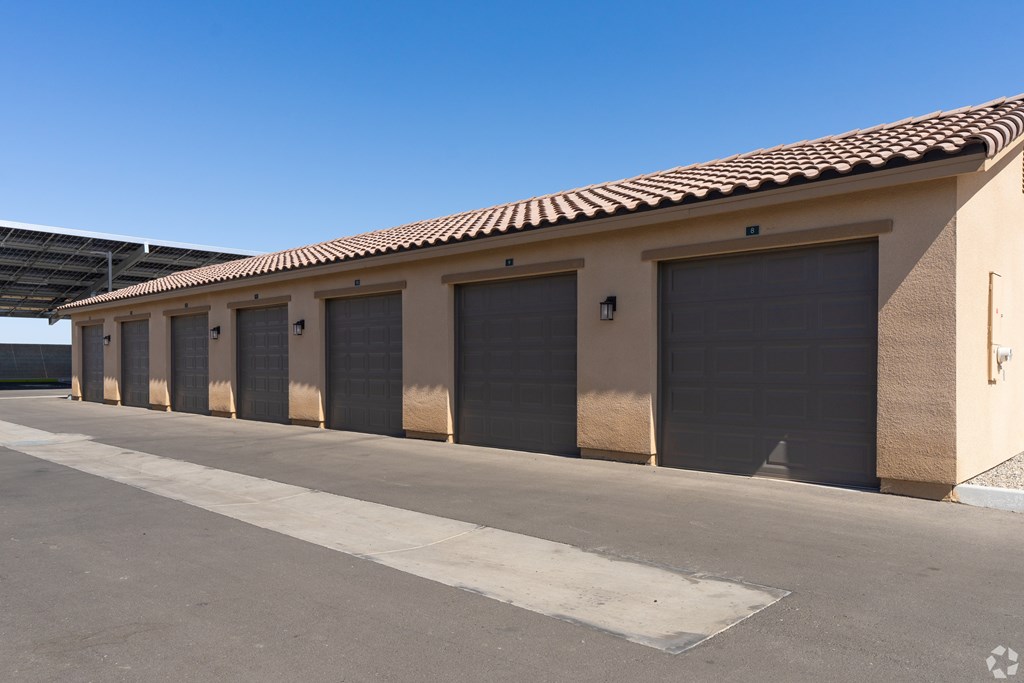 A row of garage doors are closed.