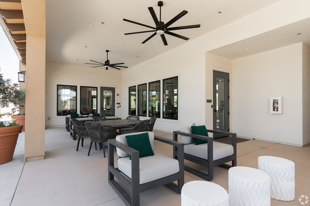 A patio with a table and chairs is shown.