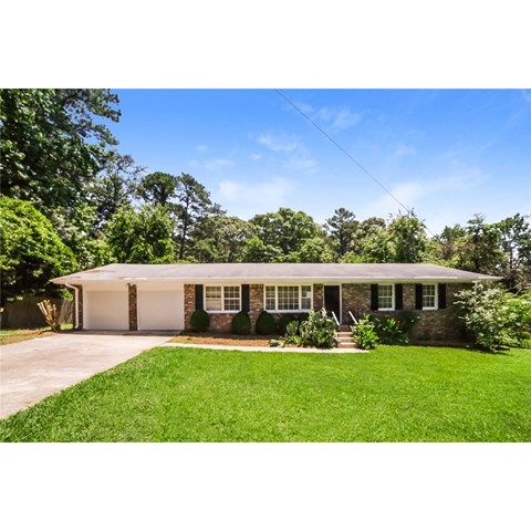 this is an image of a house with a lawn