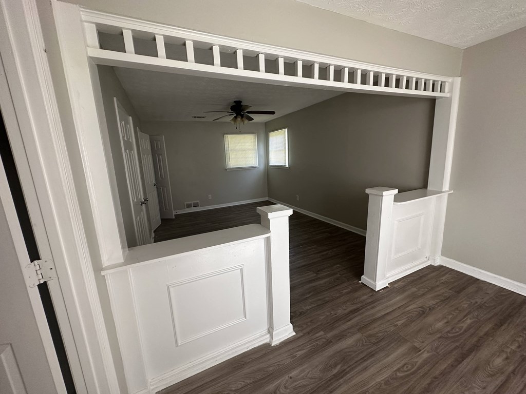 a look into the living room from the entryway of a house