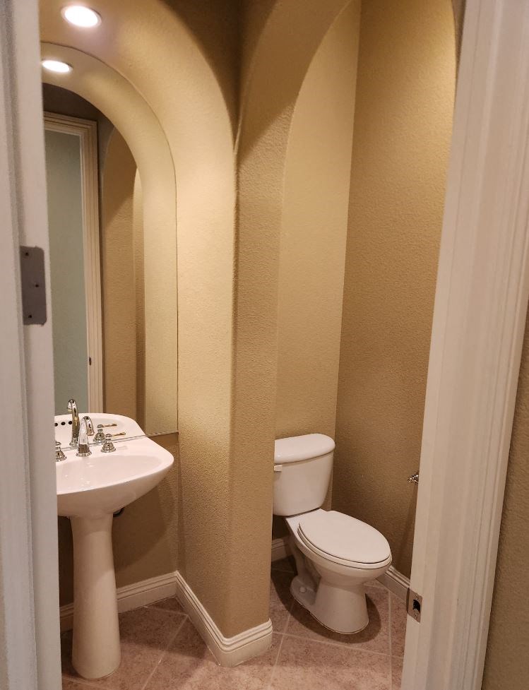 a small bathroom with a toilet and a sink