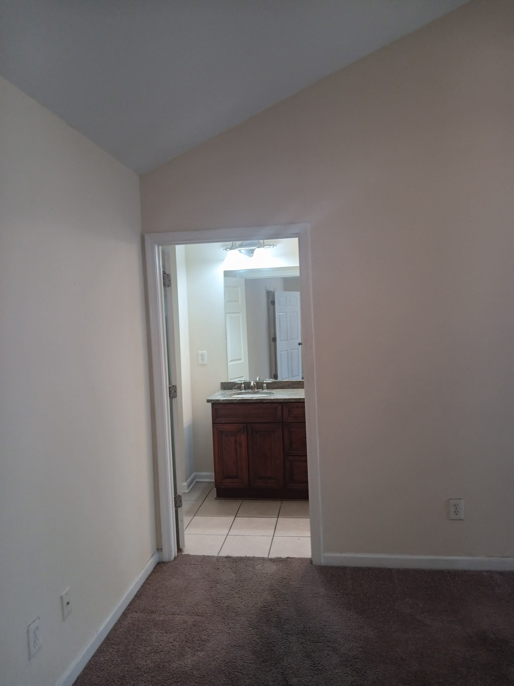 a view of the bathroom from the living room