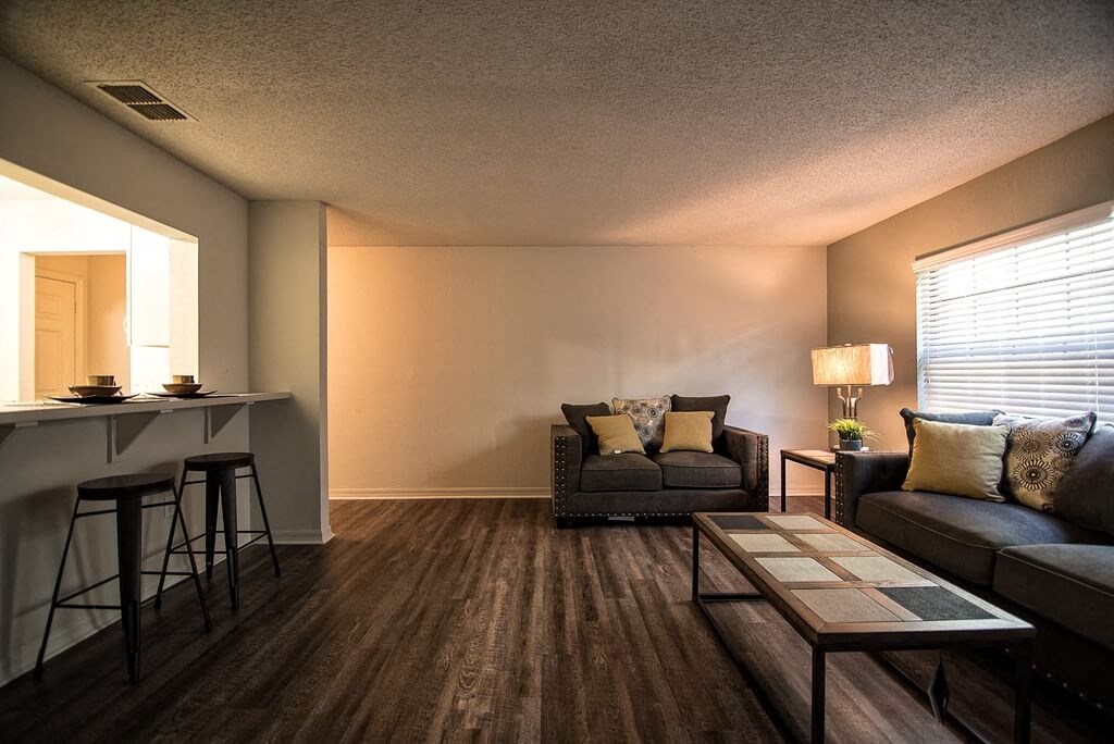 a living room with a couch and a table