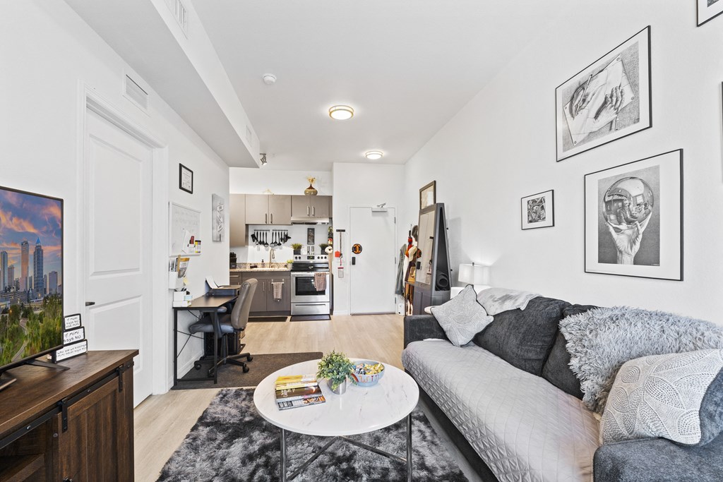 a living room with a couch and a table