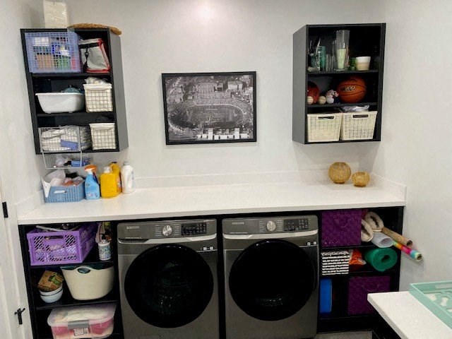 a laundry room with a washer and a dryer