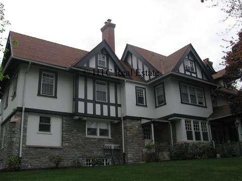 A large house with a sign that says Chichester Estate.