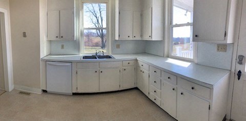 Kitchen with range, refrig & dw