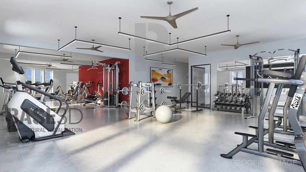 a gym with cardio equipment and weights in aria on the floor