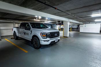 a police truck parked in a parking garage