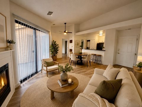 A living room with a fireplace and a couch.
