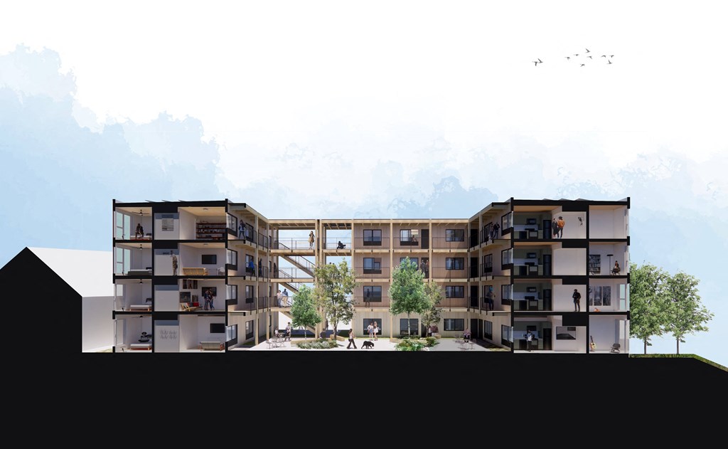 A modern building with balconies and a courtyard.