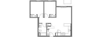 A black and white floor plan of a house with a kitchen, living room, and bathroom.