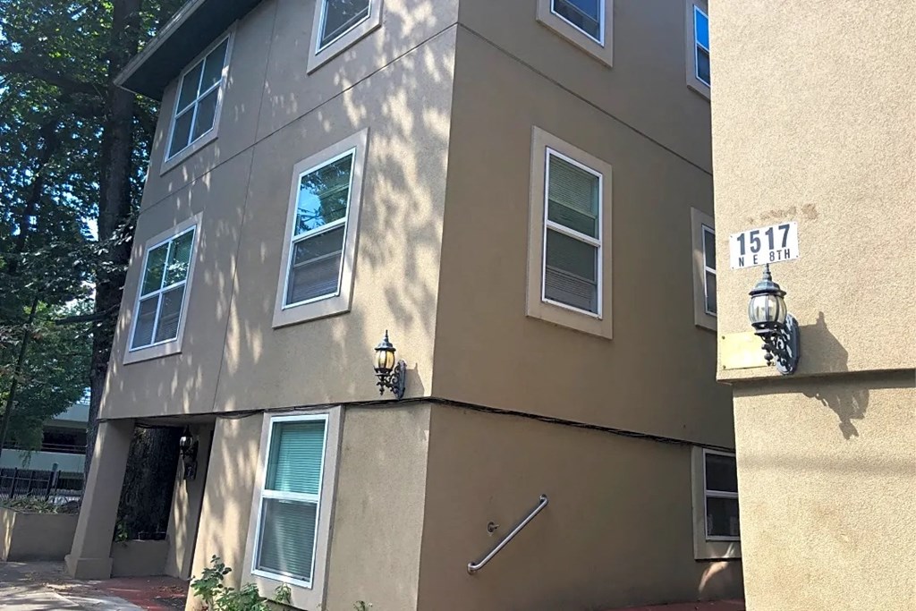 the side of a building with lights