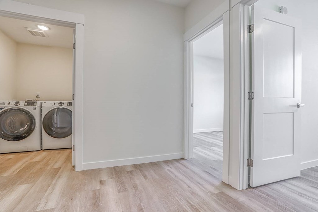 a laundry room with a washer and dryer