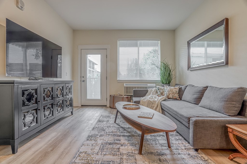 a living room with a couch and a coffee table