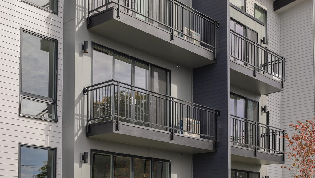 a view of the balconies of an apartment building
