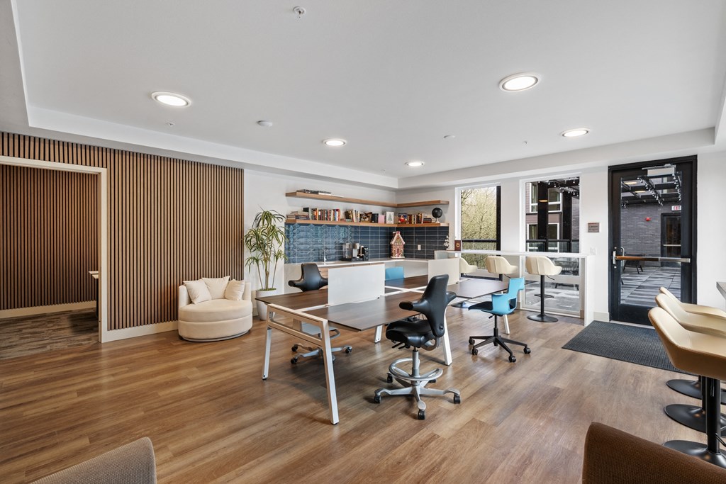 a conference room with a table and chairs