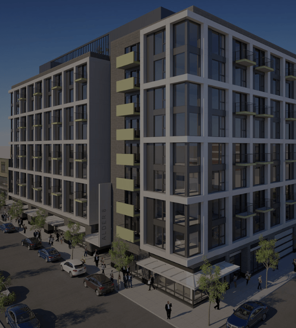 A modern building with a glass facade is depicted in the image.