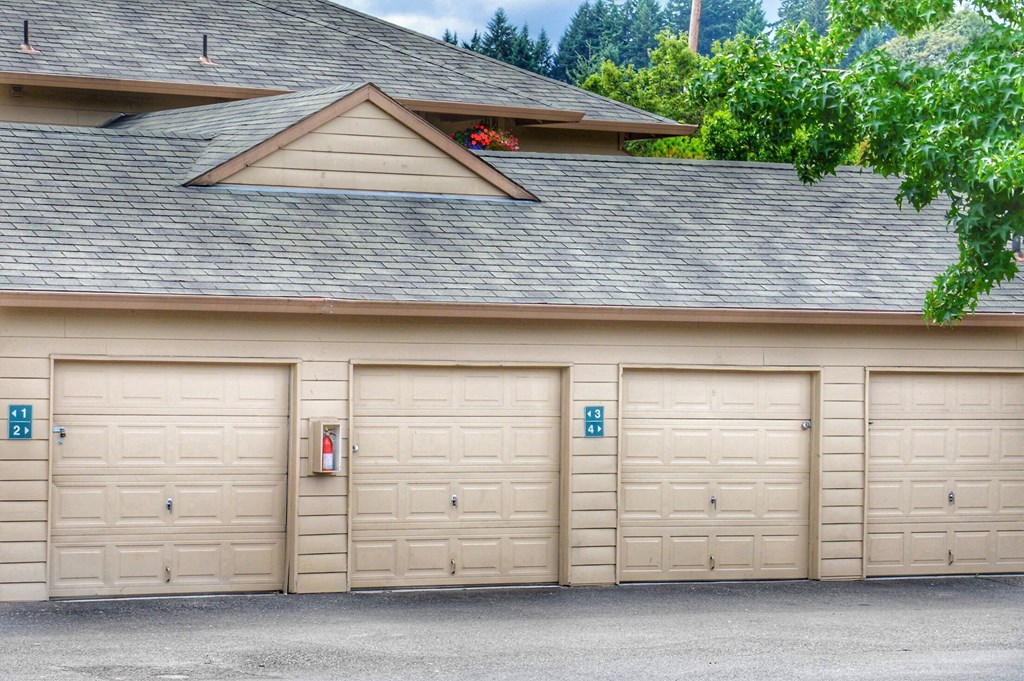 the garage of a house with a row of garage doors