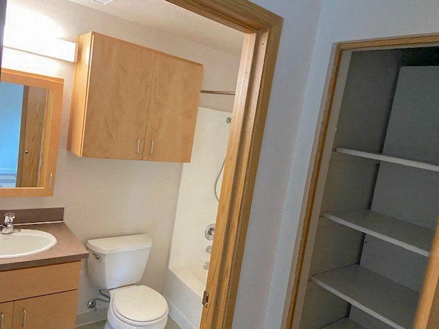 a small bathroom with a toilet and a sink