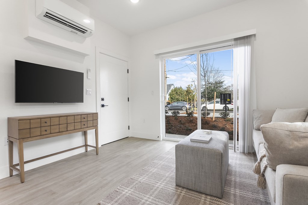 a living room with a couch and a television