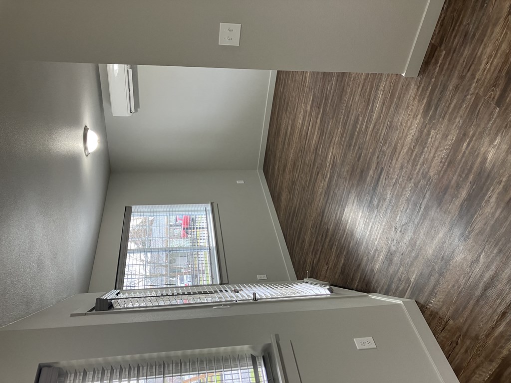 an overhead view of a computer on top of a desk