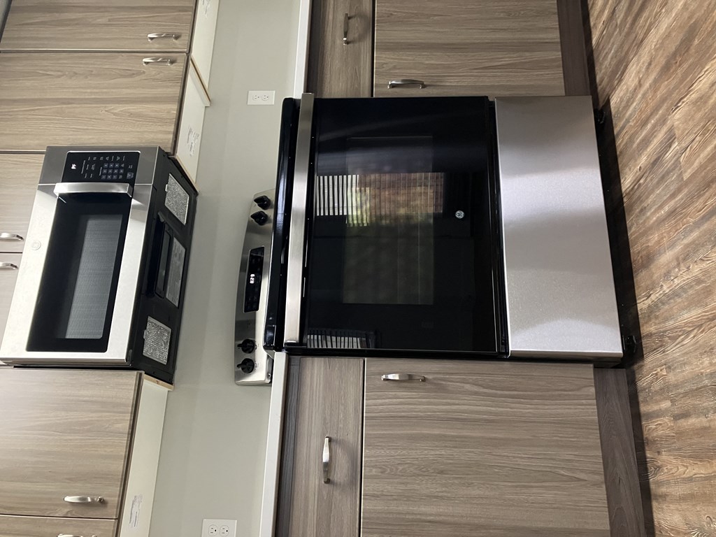 a microwave oven sitting on top of a kitchen counter