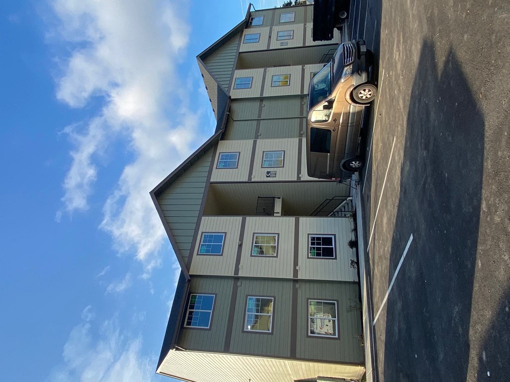 the upside down house on the side of a building