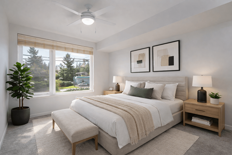 Bright bedroom with neutral decor and furnishings at The Canopy Apartments at Powell, Portland, 97236