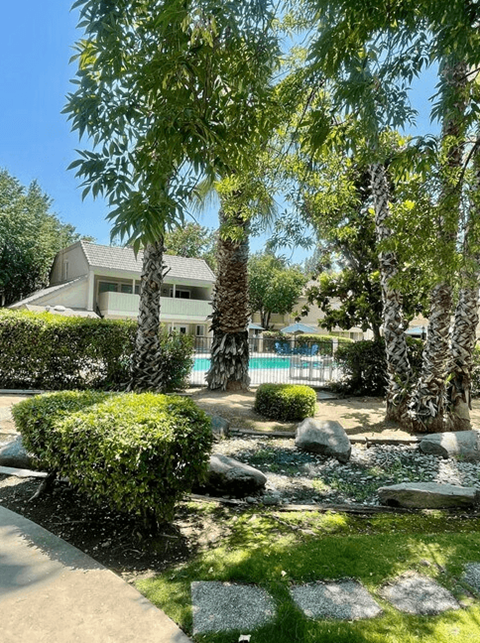 A house with a pool in the backyard.
