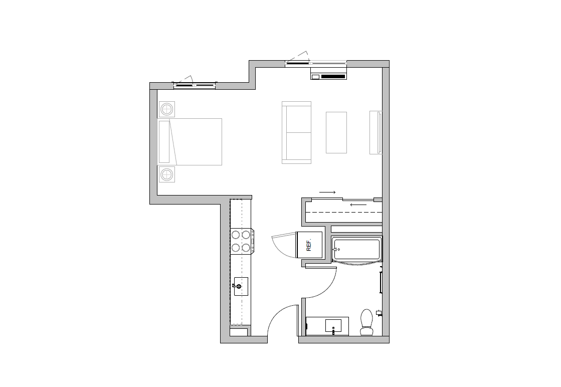 A floor plan of a house with a kitchen, living room, and bathroom.