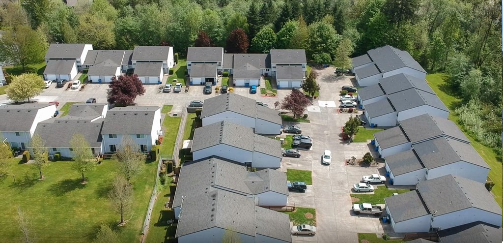 an aerial view of houses in a suburban neighborhood
