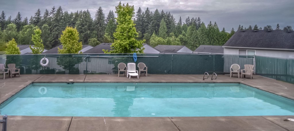 the swimming pool at the motel on a cloudy day