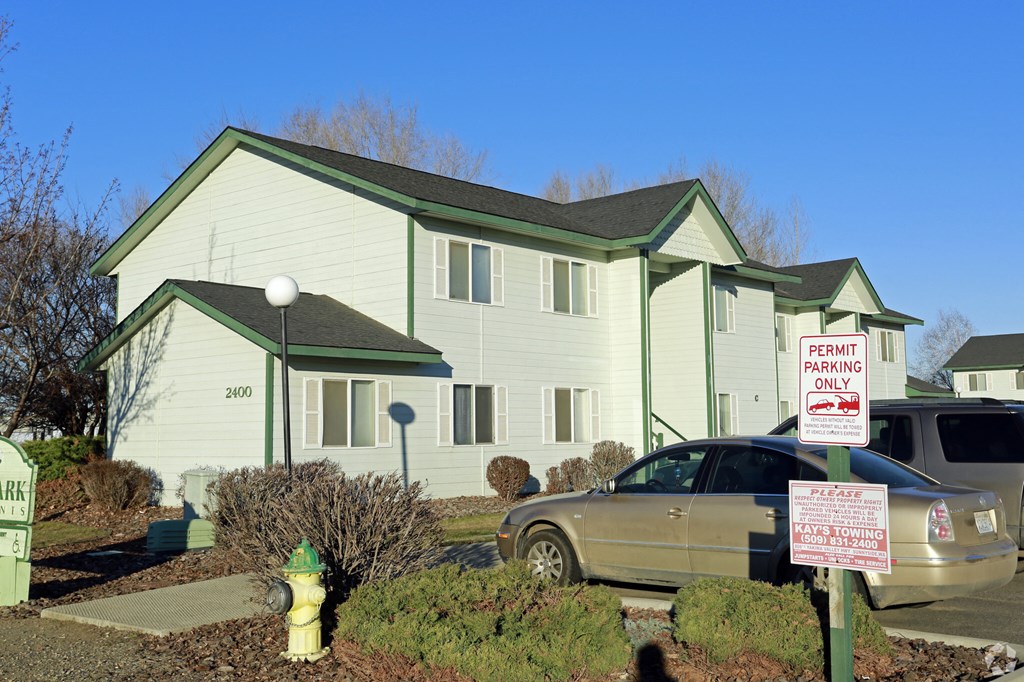 a house with a car parked in front of it