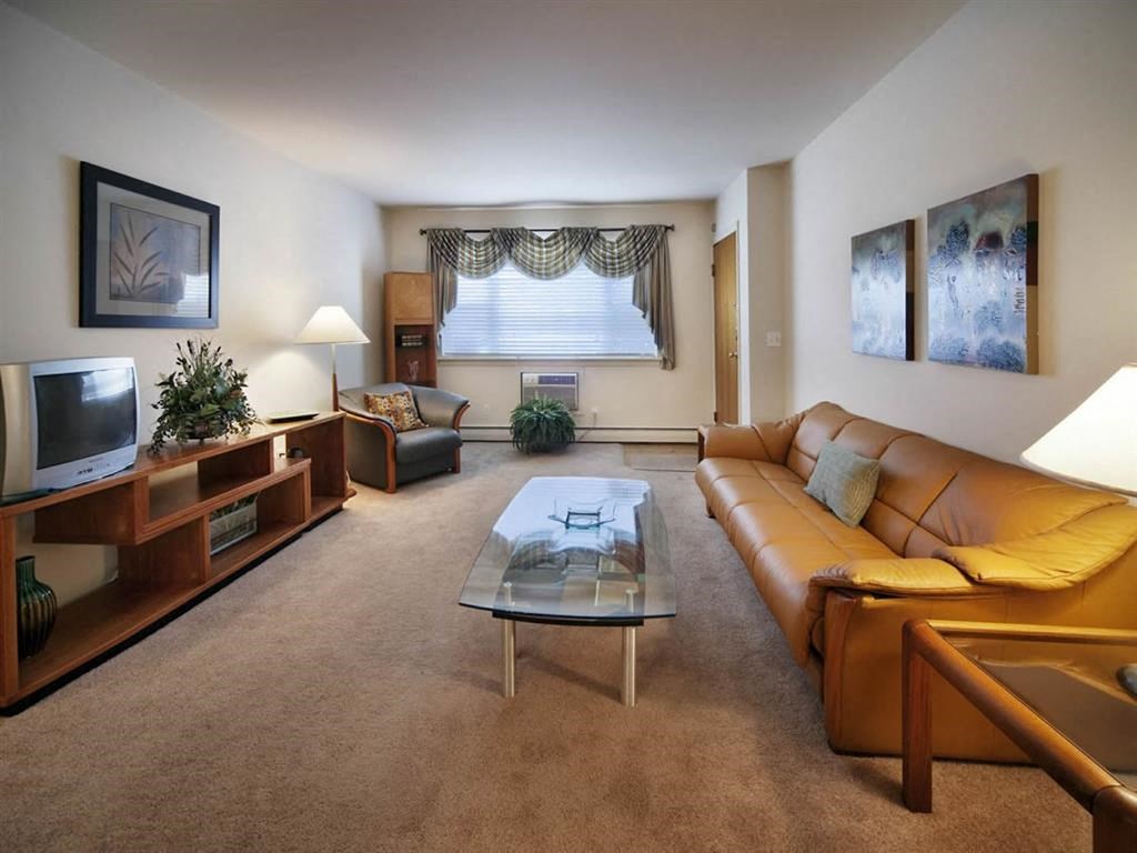 a living room with a couch and a table