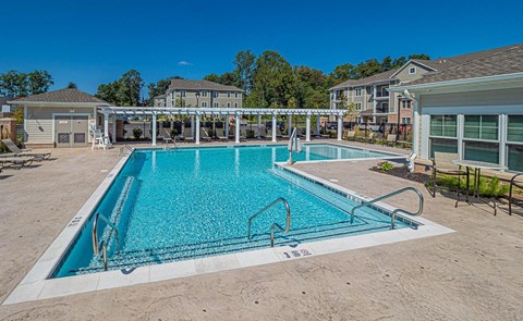 the resort style pool is adjacent to our apartments for rent